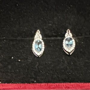 Elegant Sterling Silver Swiss Blue Topaz Earrings And CZ Stones